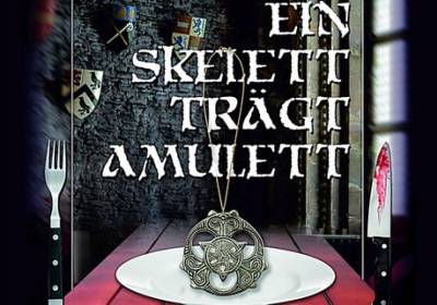 Kriminalkomödie: Ein Skelett trägt Amulett